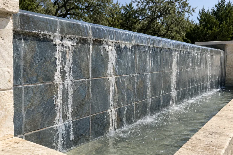 White efflorescence on the outer wall of an infinity edge